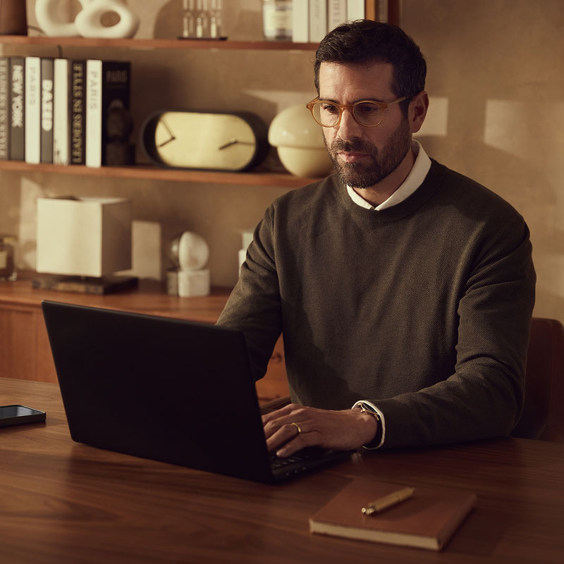 Man using his laptop in office